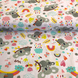 Koalas with colorful clouds and rainbows on a white background