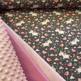 Little unicorns on a gray-brown background