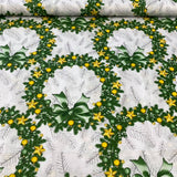 Green wreaths with yellow accents