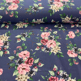 Pale pink and dark blue flowers, dark blue background