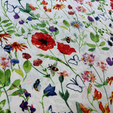 Poppies and other flowers on a white background