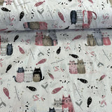 Kaķu trio rozīgos toņos