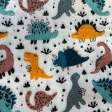 Krāsaini dinozauri uz balta pamata, flanelis.