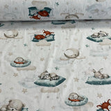 Guļošie zvēriņi ar zili zaļiem spilveniem, balts pamats