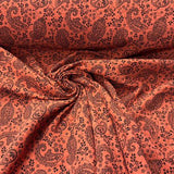 Brick orange muslin with black kidney pattern