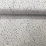 Dark purple dots, white background